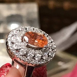 OVAL PADPARADSCHA SAPPHIRE & WHITE TOPAZ RING